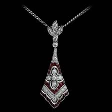 This deco-inspired 18kt white gold kite pendant features .44cts. in rubies and .28cts. in diamonds.