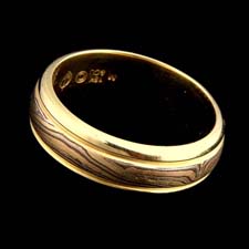 George Sawyer E color grey gold ring