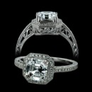 From Beverley K, this 18k white gold is diamond engagement ring made for an Asscher and has an octagonal shaped diamond halo.  The intricate design on the sides of the pave' band and underneath the center diamond is done by hand. All edges are milgrained. There are 0.16 carats total weight of diamonds in the setting. Please call for center stone pricing. This ring is also available in platinum. 