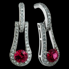 Fiery and cheerful spinel centerpieces are electric in this flowing diamond earring, designed by Durnell.  The swing movement and brilliance of the drop is invigorating to any outfit.  Interchangeable drops are available for the hoop.
