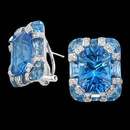 These 14K white gold earrings feature vivid blue topaz surrounded by diamonds. The total carat weight of the blue topaz is 17.06 and the total carat weight of the diamonds are 0.33. These earrings measure 20mm x 16mm.