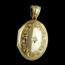 English jeweler Charles Green's beautiful 18kt gold hand engraved locket with single diamond. This locket measures 25mm X 19mm. The finest made!
