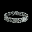 This lovely 18k diamond eternity wedding band from Beverley K has .12ctw of diamonds set in an intricate floral design. This ring is 4.0mm wide.