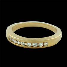 This channel set diamond band contains .24ct. total weight of diamonds and is a size 6+