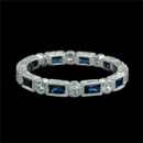 This is a gorgeous 18kt white gold antique style diamond and sapphire eternity wedding band from Beverley K.  There are .57ctw of baguette sapphires and .25ctw of bezel set round diamonds in the ring. The antique style of this ring borrows from the Art Deco period of design in the 1920s. The ring can be made in yellow gold, rose gold, and platinum. 
Platinum $3,350. This ring measures 2.5mm wide.