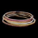 Spark's stackable prong-set bangles in 18K gold. The bracelet are set with pink and yellow sapphires and priced separately. In addition is the diamond bangle with a total carat weight of 0.90 carats. The price is for the diamond bracelet.