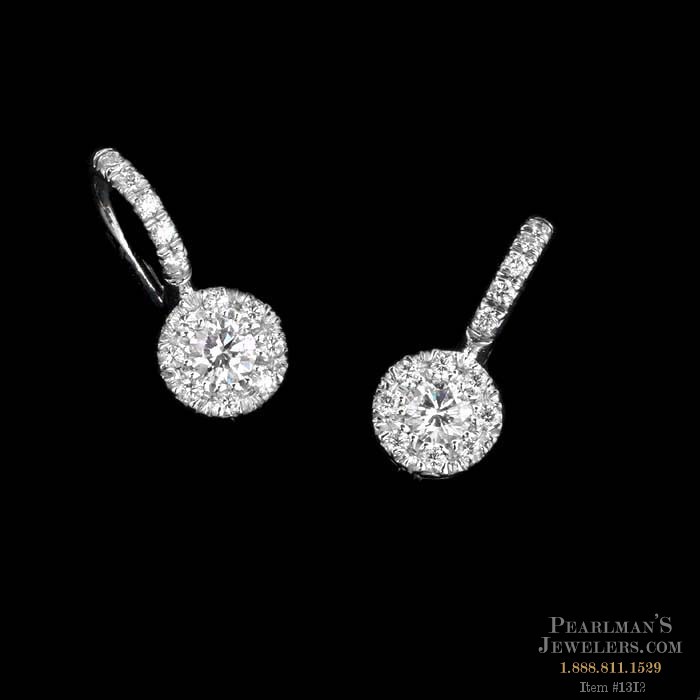 An exquisite pair of 18kt white gold earrings contains .66..