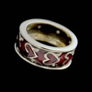 18kt yellow gold red enamel heart design ring with 16 diamonds.