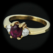 A gorgeous 18kt yellow gold ring set with .80ctw of rubies and .30ctw of diamonds.  This ring is a size 5.75 and the band measures 2mm width.