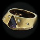 This is a 18kt yellow gold amethyst Hollander ring.This piece also has 8 diamonds The size is 6.5 and band is 5mm thick.