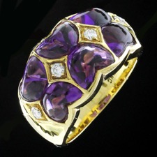 This is a gorgeous 18kt yellow gold Winc creations fashion ring. That includes 6 heart shaped amethyst and 4 beautiful diamonds .12ct tw.. The size is 6.5 and is 11.5mm in width.  