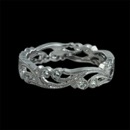 This is an 18K diamond eternity wedding band from Beverley K.  The swirling Vine design includes .21ctw of diamonds.  The ring is 4mm in width.