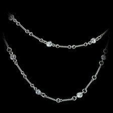 White gold, medium weight twist link chain by Durnell, with white sapphires.