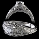A very pretty hand engraved filigree Edwardian era style platinum diamond ring. This exquisite piece is set with .12ct of VS F ideal cut diamonds. Ring measures 8.1mm and tapers down. This ring is available in 18kt, 14kt white or yellow gold. Ring needs a 1/2ct or larger diamond. This is a die struck ring then made by hand. The best there is. Made in America!!