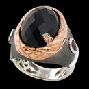 A beautiful sterling silver black onyx ring from Bellarri. The ring has two rhodonite on the side, with a weight of 0.90tcw. The onyx has a weight of 12.40tcw. The signature "B" has two small diamonds weighing 0.01tcw. 