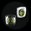 These beautiful sterling silver and 18kt yellow gold "Riverstone" earrings each contain one cabachon Peridot in the center. Another signature design by Robert Lee Morris. These are a clip measuring 19 x 20mm.