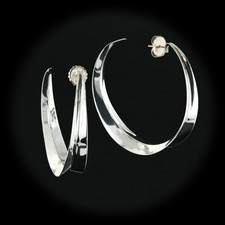 One pair of Robert Lee Morris sterling silver earrings, 2 inches in diameter. 