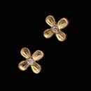 Here is a really cute little set of earrings. Cathy Carmendy's 20kt gold flower earrings with center set diamond centers.