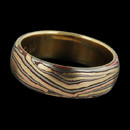George Sawyer's exotic 7mm <q>E</q> color half round men's band of 18kt red gold, yellow gold, grey gold and copper.