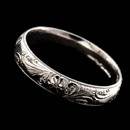 The detailing on this Charles Green, 18kt white gold hand-engraved scroll and flower design is remarkably intricate. A classic and unique wedding band. This is a handmade die struck ring 4mm & 6mm widths available. This is the finest made!