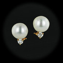 These South Sea Pearl earrings are so beautiful.  The pearls measure 11mm each and are accented with full cut round brilliant diamonds with a total diamond weight of .50ct. The earrings are done in 18kt yellow gold with an omega back to hold them in place perfectly.
