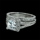 This is an absolutely breathtaking 18k ladies engagement ring from Beverley K.  The center princess diamond is surrounded by a delicate pave halo with small bezel set diamonds in each of the corners.  The split shank has pave' set diamonds and will allow for a wedding band to sit flush.  There are a total of 0.36 carats total weight of G/H color VS clarity diamonds in the setting. The ring features much hand engraving and milgrained edges.  Please call for center stone pricing. Also available in platinum. 