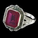 A very fine 14kt white gold synthetic (flat top) ruby Art Deco ring corca 1920.  
Remarkable condition for the age.  No chips or scratches on the stone.  Engraving still intact.  The ring my have been resized/re-shnked.  
As good of condition that we have seen.  Size 6, weight 3.6 grams, 16mm at the widest.  