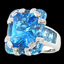 A stunning 18K white gold blue topaz and diamond ring from Bellarri. The total carat weight of the blue topaz is 7.30 and the surrounding diamonds have a weight of 0.17ctw. The ring's head Dimensions are: 20mm x 16mm. This is a true work of art.