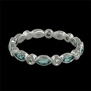 A captivating aquamarine and diamond eternity ring in 18kt white gold. This ring features .86cts in marquise cut aquamarines. 2.5mm width.
Also available in platinum and different gemstone variations.