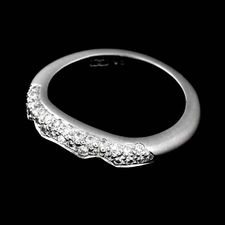Platinum diamond Chris Correia ring used as a wedding band.