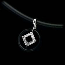 Platinum and diamond necklace with black rubber accent on a barrel clasp and black rubber cord from Chris Correia. Pave diamonds on the square diamond deco center-piece.