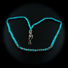 A beautiful full beaded turquoise stone necklace rich in blue color. The vintage piece is measured 16
