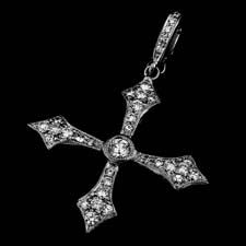Cathy Carmendy platinum and diamond cross pendant with a diamond enhancer bail.