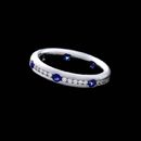 Whitney Boin platinum diamond and sapphire 3.5mm wedding band. This band contains .28ct. total weight in round brilliant diamonds and .35ct. total weight in blue sapphires. Also available with pink sapphaire and ruby.  We have use natural colored diamonds also.  Please call for specific requests. Handmade in America.