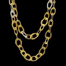This 36 inch handcrafted necklace is made with 18k/22k yellow and white gold. The white gold links feature round white pave diamonds, 1.916ct in total. Making this necklace a sophisticated masterpiece, with graceful balance. 