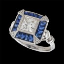 OMG, here is a ring one definitely has to see. A 18 karat white gold blue sapphire Beverly K engagement ring. The ring holds a square center diamond of approximately 5.3mm x 5.3mm, surrounded by fine milgrain detailing. The ring is set with 1.56 carats of bright blue sapphires and 0.07 carats total weight in diamonds. The center diamond is not included. Please call or go online for an excellent selection of center diamonds by Pearlman's to compliment this fantastic setting.   