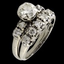 A vintage wedding set of 14kt white gold engagement ring and matching wedding band.  The set is a size 7.25 and both ring weigh total 4.7 grams.  Center diamond measures 6.42mm x 6.45mm x 4.0mm and has a calculated weight of  1.00 ct.  
The diamond has a slight cleavage at the table edge running slightly down the star facet.  I grade it a eye clean SI2. Color estimated JKL and the cut is very good 58-59 table.  

Diamond was not removed for grading.  Set on each side of the main diamond are 4 full cut round diamonds each weighing approx. .05ct each (.20ct total.  
Wedding band is set with 5 full cut .05ct diamonds weighing approx .25ct total. Smaller diamonds are SI-I1 clarity and are I-J color.   
Priced right as a set.