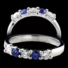 Our classic 18kt white gold sapphire and diamond 5 stone band.  The ring is set with 3 diamonds (.24ct total) VS G-H diamond and 2 Swiss cut intense blue sapphires  .23ct total. These can be made in all sizes.  3mm width. 