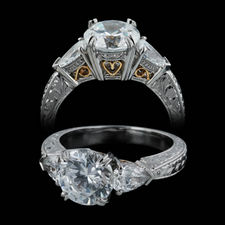 This lovely and classic Michael Beaudry engagement ring is a hand made platinum semi-mount with unique 22k yellow gold filagree work and dazzles with two pear-shape .66ct tw. side diamonds. Shank 3.75mm in width. Center Diamond not included.