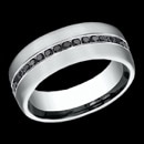 A masculine black diamond 14k white gold Benchmark mens wedding ring. This ring is 7.5mm in width and features black diamonds going half way around the band. The total carat weight of the diamonds is 0.40tcw. Price is for a size 10, but this Benchmark ring can be made in other sizes. Prices may vary based on finger size.