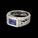 Cathy Carmendy's exquisite platinum, tanzanite, and diamond finger ring is from the 'French Lace' collection. The ring is set with a gem 1.71ct Tanzanite and 0.20ct of fine diamonds. This ring measures 9mm in width.
