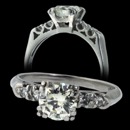 This beautiful ring fetures a .77ct center stone with .10ct side diamonds. Made with 90% platinum. This is a size 4.75 and is ready to ship to you today! 
