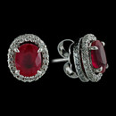 From the *Trois* collection, a simply stunning platinum pair of diamond and ruby earrings from Michael b.  The ruby's are 3.86ctw and are surrounded by two rows of sparkling pave diamonds that cover the top and sides of the halo's.  