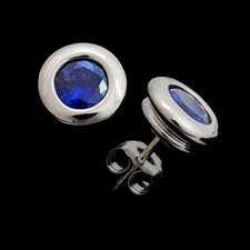 Our classic 18kt white gold bezel set sapphire earring. These are the finest sapphires available and weigh .70ct. tw. Very intense color blue. Eat your heart out Tiffany & Co.