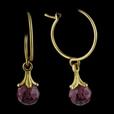 Striking pair of 18kt yellow gold Rhodalite Garnet earrings.  Stones measure 5mm. Also available in the larger 7mm size and in platinum. Call for pricing.  