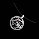 From the new Chris Correia Bubbles collection.  A beautiful 18kt white gold diamond, ruby, onyx, and mother of pearl pendand on 16" rubber cord. 23mm width and .35ctw of diamonds.