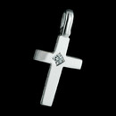 A simple and clean Latin style cross from the Charles Green collection. The cross is in 18kt white gold cross and features .03ctw in the diamond center. The cross measures 16mm x 11mm. Hand forged solid piece. 