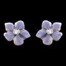 A great pair of blue enamel flower earrings from the Nouveau Collection. These earrings are made of 18k gold and feature a single diamond, weighing 0.03cw in the center of each stud. Total carat weigh 0.06tcw. These earrings measure 12mm x 13mm and weigh 4.69 grams.