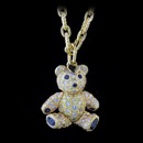 A very impressive solid 18kt gold bear set with sapphire and diamonds.  This little cutie measures a impressive 7/8'' in length. The arms, legs, and head moves.  Made in the USA. 1.45ctw,
Color G-H, Clarity, VVS, .97ctw brilliant blue sapphires.  Handmade 18kt gold chain 24 inches $4,800.00 extra 

