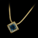 This Chris Correia 18kt yellow gold necklace features a 5mm square tanzanite, with a diamond pave' bezel  susoended from a yellow gold snake chain.